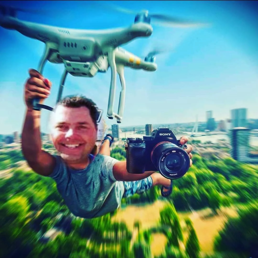 FAA-certified drone pilot launching drone for landscape site survey