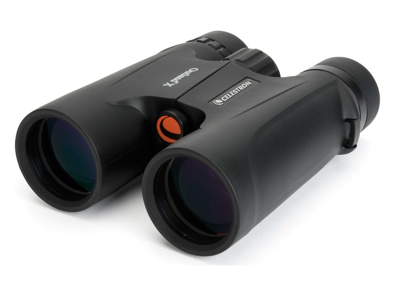 A pair of black Celestron Outland X binoculars with an orange accent