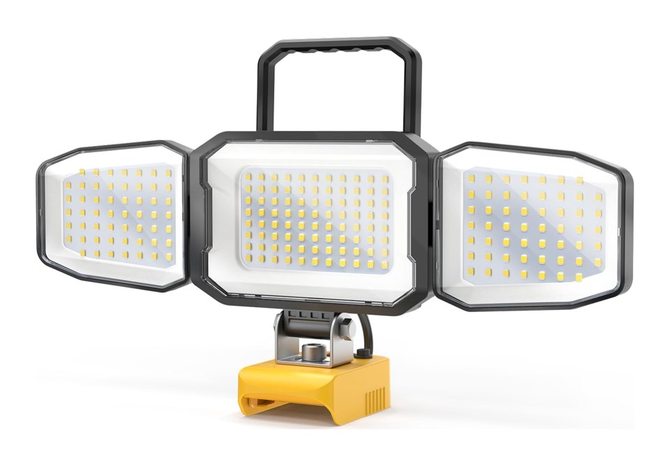 A cordless LED work light with three adjustable LED panels, a black carry handle and a yellow battery mount