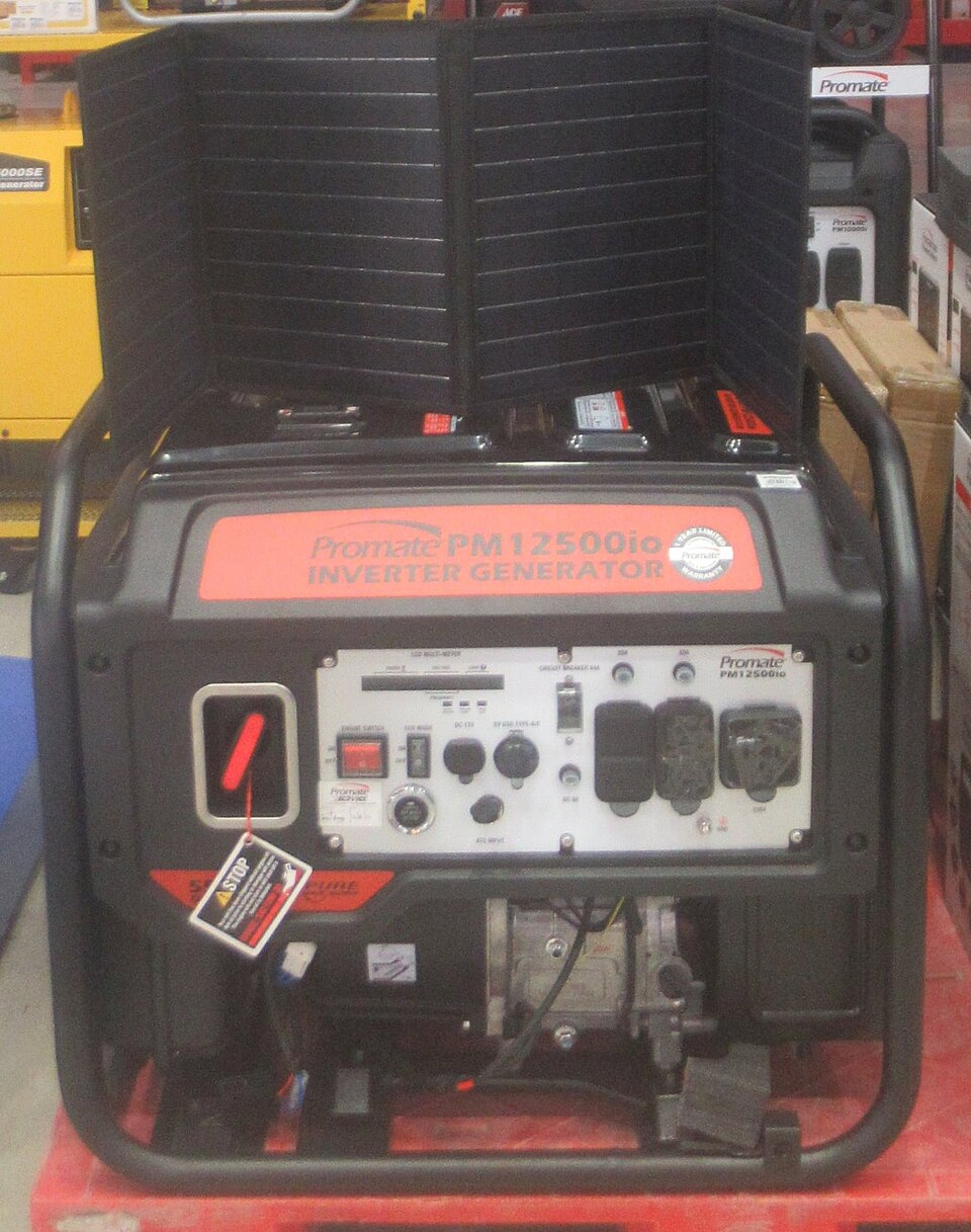 A red and black open-frame gasoline inverter generator inside a black tube frame